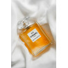 Elegant Chanel No. 5 Perfume Bottle on Silk
