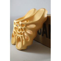 A Pair of Adidas Yeezy 450 Slides