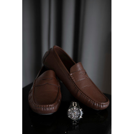 Brown Leather Shoes on a Brown Rattan Surface