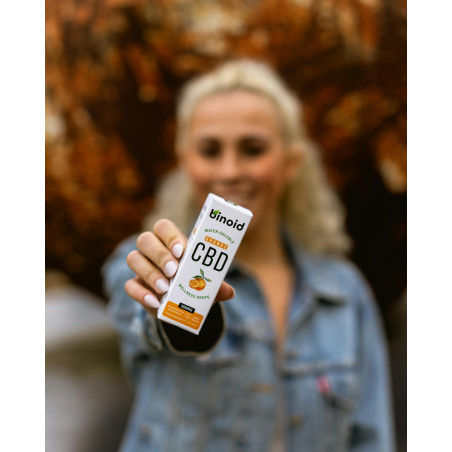 Woman Holding A Medicine Box Of CBD